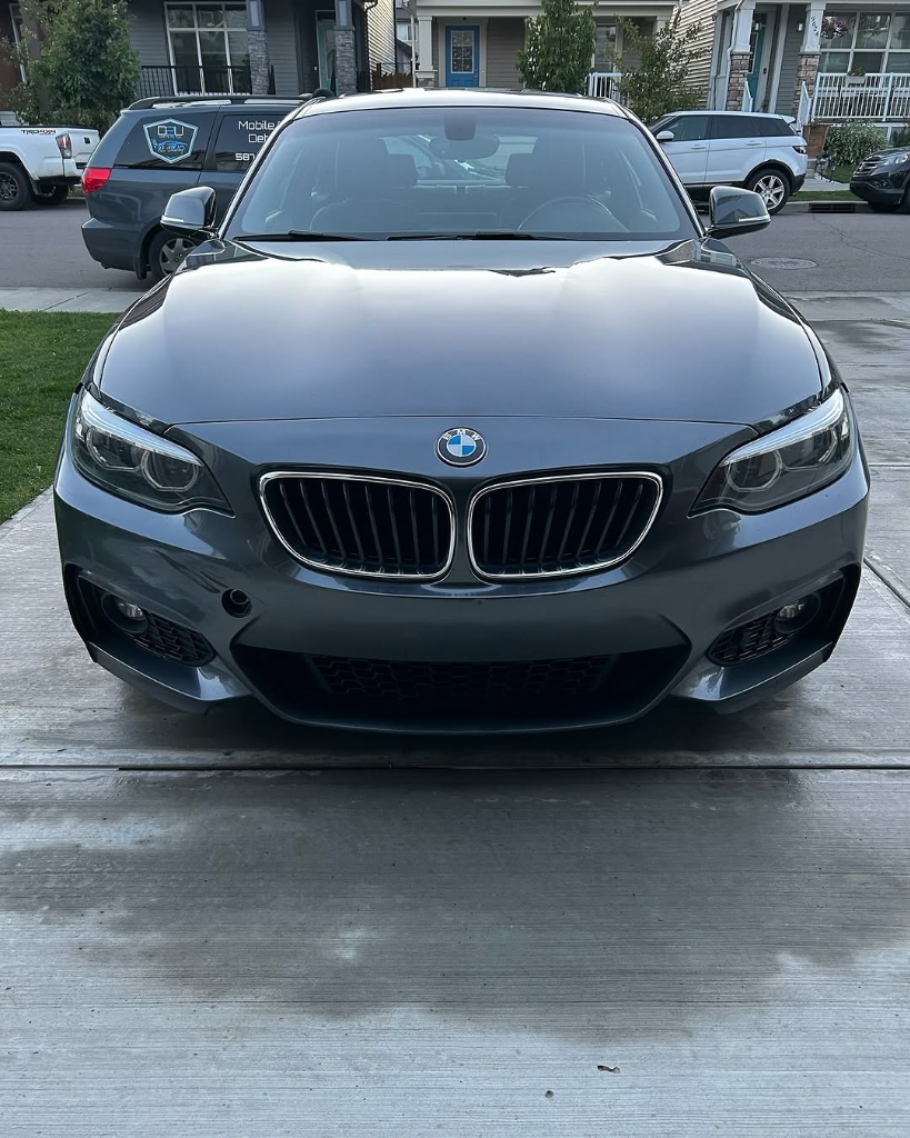 BMW ceramic coating with Deets To You van in background